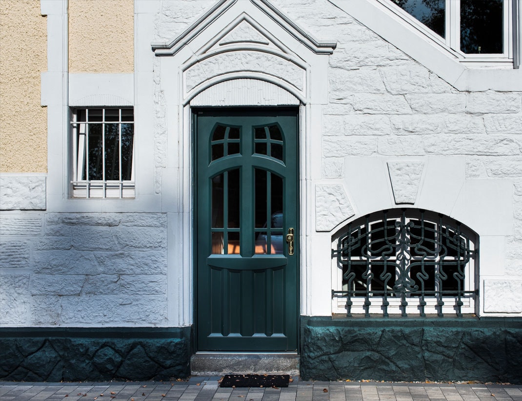Classic black panel exterior door with glass sidelights