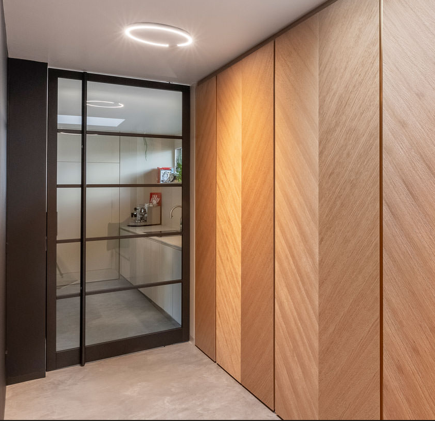 Wooden pivot door open